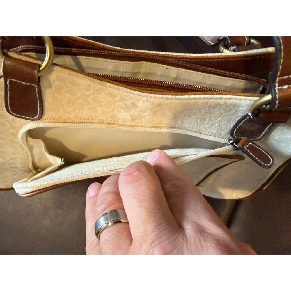 Rosetti shoulder bag with matching wallet in a white and brown color scheme.